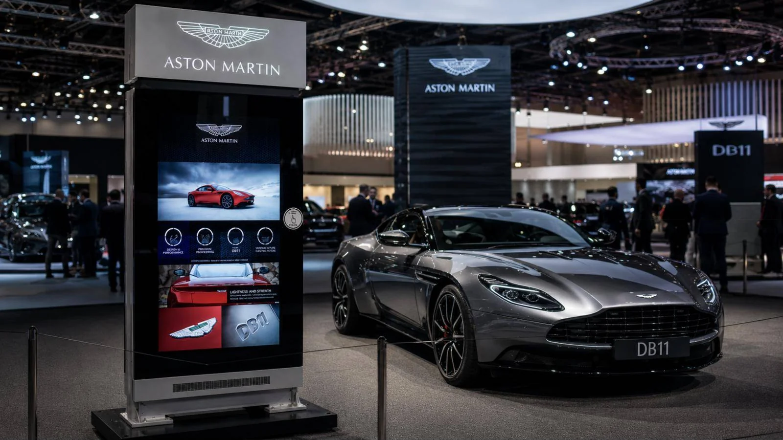 The finished 70-inch touchscreen beside a DB11 on the Aston Martin stand at the 2017 Toronto AutoShow